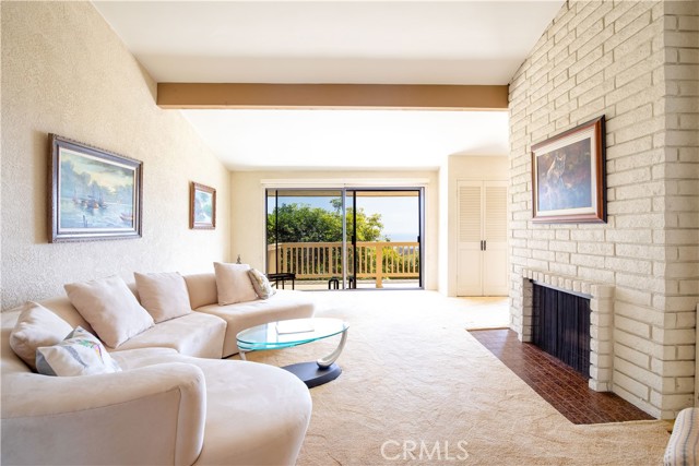 Living Room with Fireplace and Ocean View in Living Room