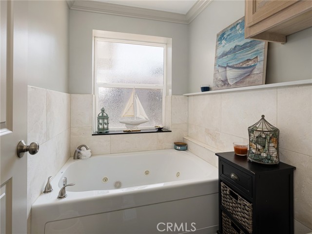 Privacy Bathtub & Toilet in Primary Bathroom