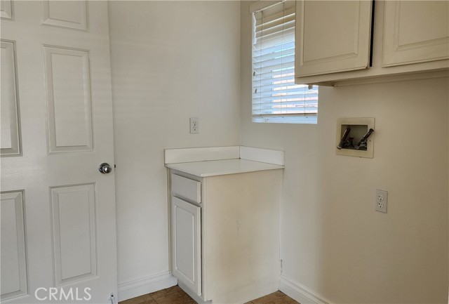 Separate Laundry Room with ample storage