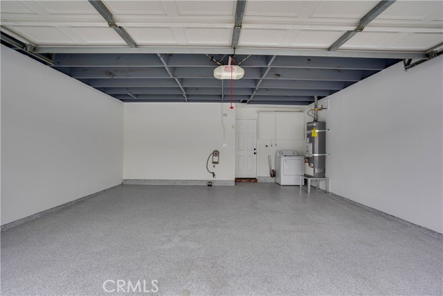 Epoxy garage floor finishing; ceilings and walls were painted as well