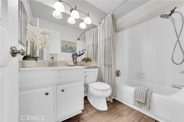 Upstairs Guest Bathroom with Tiled Tub/Shower Combo