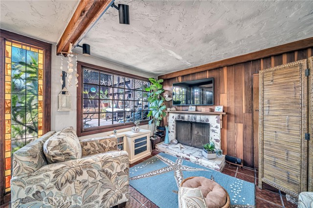 Overlooking backyard - family room with fireplace