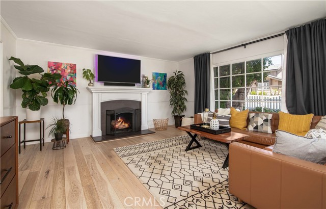 Yes there is a real wood burning fireplace, custom hearth and mantel