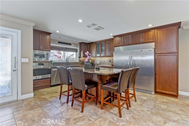 Kitchen Island-Granite Topped with Cabinets, Large Refrigerator & Freezer