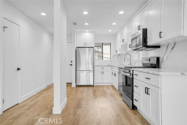 1410 Coranado Avenue, Long Beach CA: https://media.crmls.org/medias/944b3f66-ddfc-4305-84c6-3059bd672be2.jpg