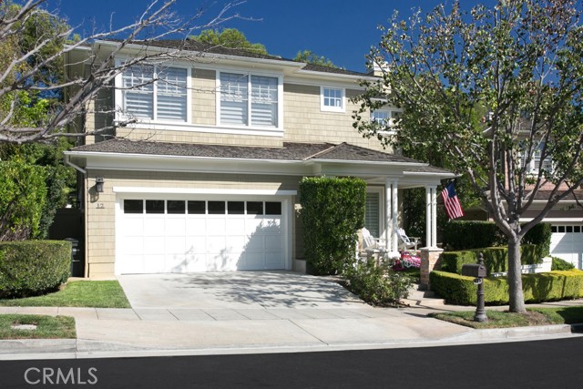 12 Turnberry Drive Newport Beach, California Behind the gates of One Ford Road, this four bedroom, four bath home with bonus loft is located on a peaceful cul-de-sac with no homes behind it. Built for entertaining, this residence features a formal living room with fireplace and high volume ceilings, hardwood floors downstairs, and a formal dining room with french doors that open to a private courtyard. A spacious kitchen with dual ovens, built-in microwave, dishwasher and refrigerator opens to the family room with fireplace. One downstairs bedroom and three additional bedrooms upstairs. A bonus loft upstairs is the perfect playroom or study! The master suite features a front sitting area, as well as a private retreat, perfect as a private office or exercise room. The master bathroom features dual vanities, spa tub and stone shower. You'll love the private private putting green in your backyard! Three car garage. This home is located in the resort-style, Newport Beach community of One Ford Road with two live guard gates, clubhouse, two pools and wading pool, playground, 3000sf fitness center, basketball, volleyball & croquet courts, and many holiday and community activities and parties. Come home to One Ford Road!