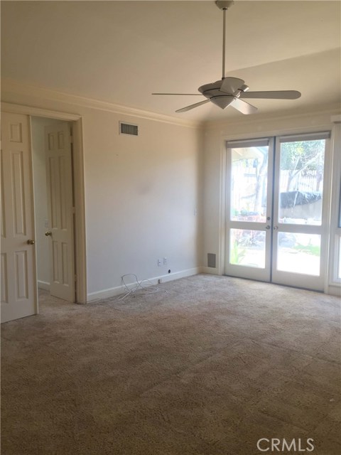 Masterbedroom double doors leading to backyard Masterbedroom double doors leading to backyard