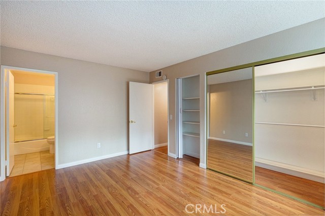 Freshly painted master suite complete with tiled bathroom and shower/tub combo...