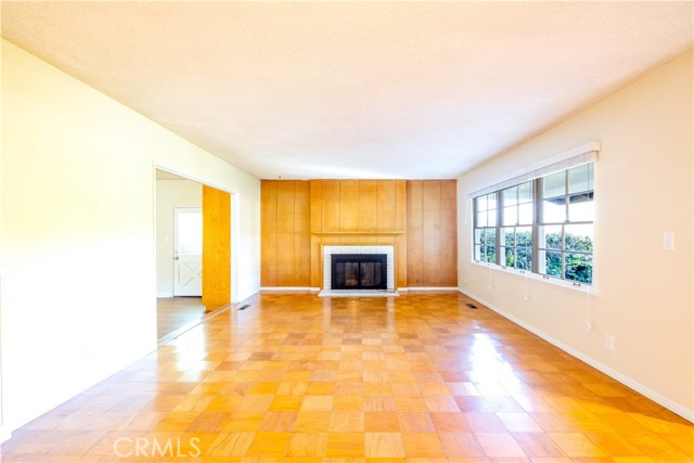 Family room with fireplace and hardwood floors