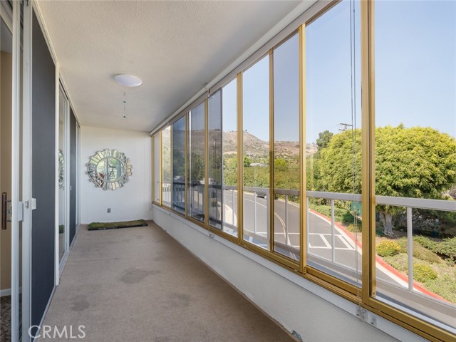 Looking back at the balcony from living room. It can be accessed from both bedrooms as well as the living room.