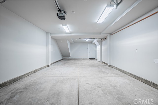 Tandem Garage with access to mult-use room.