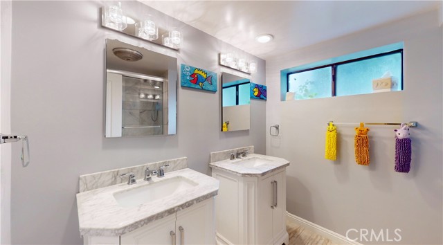 Lower level bathroom with tub and shower