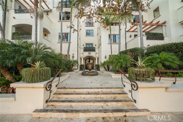 261 S Reeves Drive 105 Beverly Hills, California Stunning spacious two-story condo located in the exclusive "Maison Reeves" in prime Beverly Hills. Downstairs features an open living and formal dining area with an inviting fireplace, gorgeous wood flooring, crown molding and French doors that lead to a serene private patio perfect for outdoor dining, relaxing or entertaining. The kitchen has stainless steel Viking appliances, custom cabinetry, large center island, a casual dining area as well as bar height counter for additional seating. Off the kitchen is a den with a second set of French doors leading to the downstairs patio. Upstairs you will find two spacious bedrooms, two bathroom and laundry area. The large master suite has French doors that lead to the upstairs patio, two walk in closet areas with custom built-ins. The luxurious master bathroom features a large vanity with marble counter tops and dual sinks, large shower and separate soaking tub. This unit has 3 parking spaces and additional storage in the secure subterranean garage. This is a high service and luxurious building with immaculately maintained spaces, state of the art fitness center with sauna, and 24 hour security. This is the perfect location just one block from South Beverly Drive with its numerous bakeries, restaurants and boutiques, less than 2 blocks south of Wilshire between Charleville & Gregory and a short distance to all the world class shopping and dining that Beverly Hills has to offer.