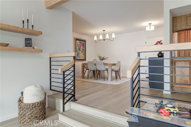 Brand new laminate floors connect the dining space with the living room.