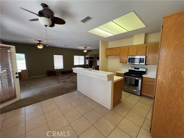 Breakfast nook open to kitchen breakfast bar family room