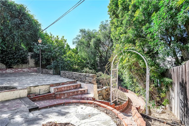 lots of brick and flagstone in the back yard