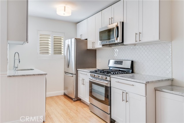 kitchen with carrera marble countertops