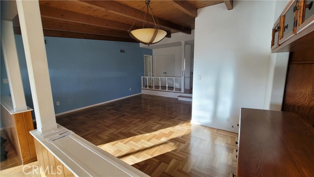 Living room, looking towards entrance to hallway