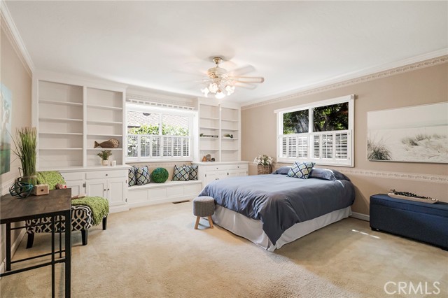 Bedroom 3.   Note all of the built-ins!
