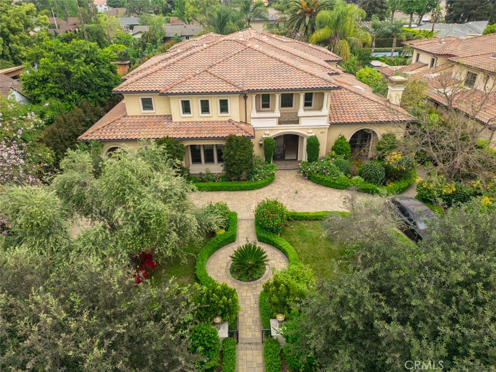 Beautiful Mediterranean Estate built by Franklin Development. This great property has alot to offer, from 6 bedrooms, 9 bathrooms, theatre room, wine room, formal study, gym room with sauna and dual staircase at the entry for that wow factor. The kitchen has wolf built in ovens and is bright and open to the informal dining area. There is a separate butler's kitchen and large pantry. Each bedroom is its own suite with a private bathroom and great closet space. The backyard offers landscaped grounds with sparkling pool, spa and waterfall as well as a covered patio with built-in BBQ area and courtyard for basketball. Great for entertaining. There are two car garages. The front has an added roundabout driveway. So many available amenities are only a short drive from the property.