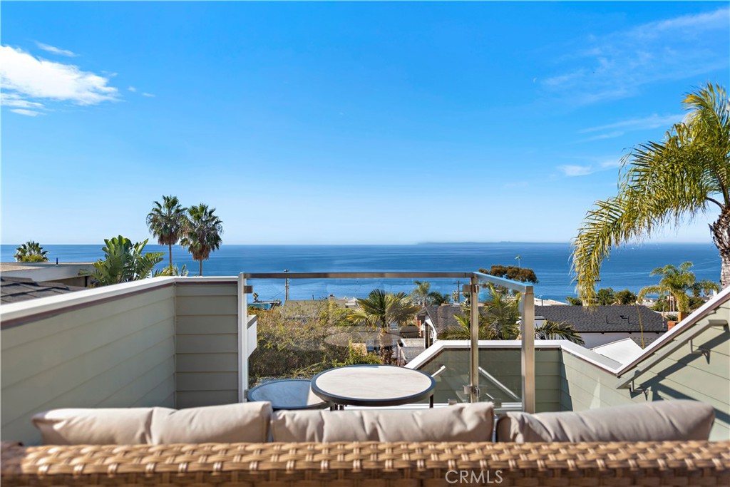 LOCATION! 600 +/- feet from the iconic Thousand Steps Beach. This breathtaking Laguna Beach home offers incomparable views of the Pacific Ocean and Catalina Island from its rooftop deck. 

Built in 2009, this home features 2 primary suites, each with its own ensuite bathrooms. 

The upper primary suite boasts ocean views, its own fireplace, a wet bar, and rooftop deck access.

The lower primary suite features a jetted tub and private access to the outdoors, complete with an outdoor shower. 

Enjoy open-concept living with plenty of natural light and central AC throughout.

The modern kitchen is equipped with stainless steel appliances and plenty of bar seating, as well as a utility closet/pantry. The living room features a fireplace and an awe-inspiring water feature outside. 

Relish in 180-degree views of the ocean and coastline without the hassle of HOA fees, while surrounded by zen-like landscaping. Furnishings are negotiable, making this luxury home move-in ready. 

Direct access, attached garage, with access to the 240-volt charger for your electric car. Extra driveway space for guests. 

Close to world-renowned dining, shopping, and beaches. 

Make this home your very own slice of paradise and delight in the magnificent beauty of Laguna Beach.