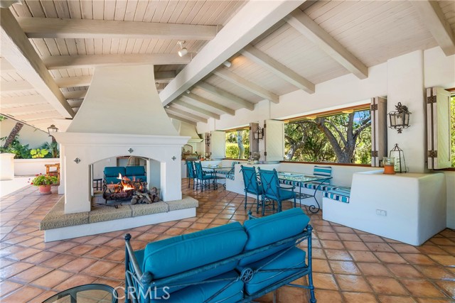 outdoor Cabana with 4 sided fireplace