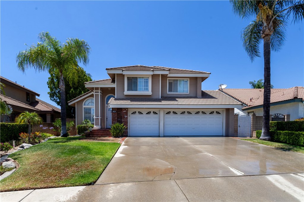 Opportunity knocks to own in North La Verne. This beautiful 4 bedrooms 3 bathroom home features many upgrades and a beautifully landscaped backyard. The first floor includes the living room, dining room, kitchen, 1/2 bath, laundry room, and family room where you gain access to the backyard through french doors. Upstairs you will find 3 bedrooms and a full bathroom, master bedroom with private master bath featuring a large bubble tub and stand-in shower. Upgrades include a new kitchen with granite countertops, bathroom vanities, ceiling fans, landscaped backyard with pool and spa, and built-in BBQ area. Enjoy the views of the Foothills while sitting next to the large outdoor gas fireplace or from the pool or spa.