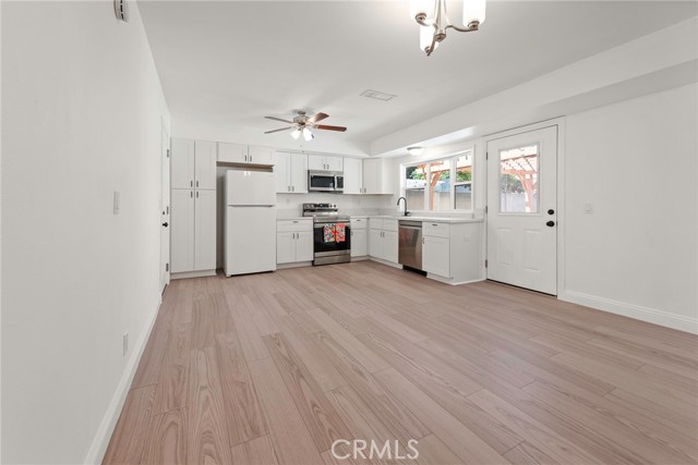 Remodeled Kitchen With Quartz Counters and New Appliances