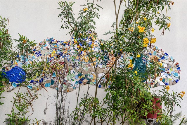 A mosaic masterpiece behind the bushes!