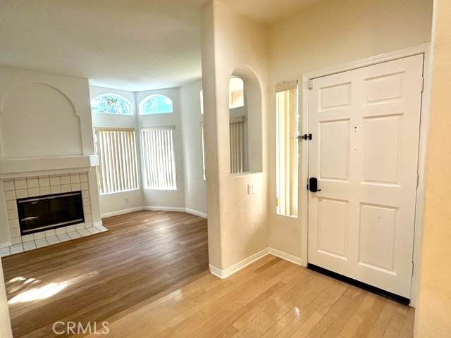 Step into the inviting entryway, you'll be struck by the seamless flow into the spacious living room