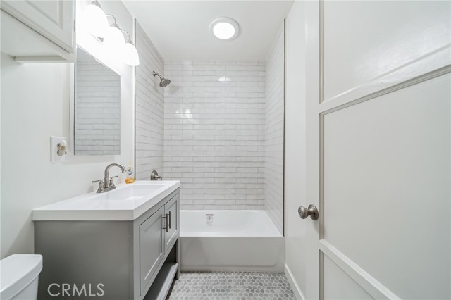 Full bathroom located off central hallway