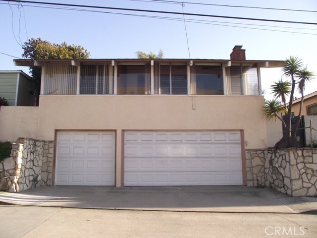 Exterior of 1102 7th Place with 3 car garage