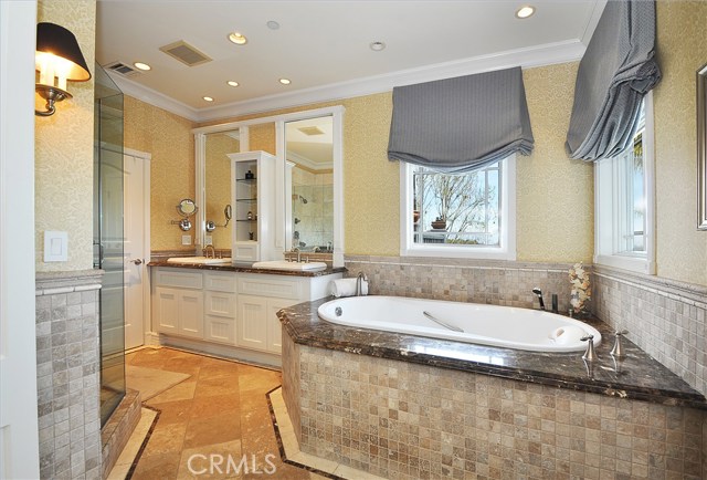 Master bath room with jacuzzi tub, shower and double vanity