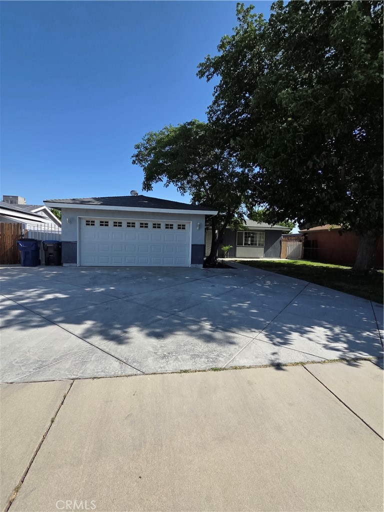 355 Woodlark Street Lancaster, California Welcome to 355 Woodlark St. This home sits on a tranquil and quiet cul-de-sac street. Beautifully maintained 4 bed 2 bath home that's move in ready and perfect for your next chapter! Freshly updated with brand new carpet in two of the bedrooms and all-new interior paint, this home, offers comfort, cleanliness, and charm throughout. The cozy kitchen includes all appliances- refrigerator, dishwasher, range, and microwave, making it truly move in ready! Situated near schools and retail centers, this home offers convenient access to shopping, dining, and essential services. Target, Lowe's, Dutch Bros, Chase, Bank of America are all conveniently located within 1.3-1.7-mile radius.
Enjoy a generous backyard space, ideal for entertaining, relaxing, or letting kids and pets play freely. This home has been very well taken care of and is ready to welcome its next family! Don't miss your chance to own this gem in a great Lancaster neighborhood!