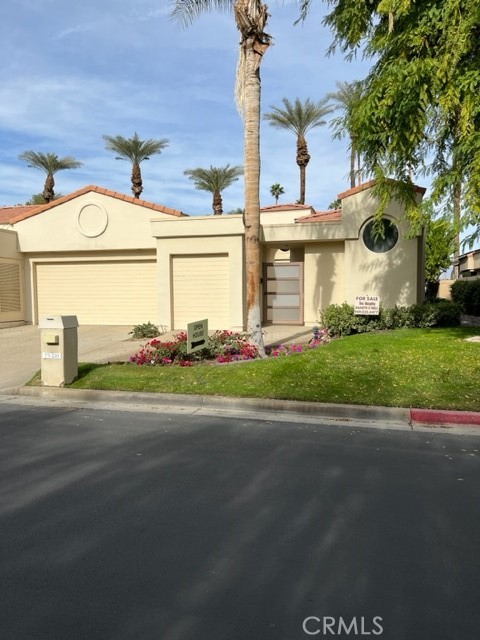 PRICE IMPROVEMENT! Beautiful 3 bedroom 3 bath condo in Desert Horizons Country club with over 2500 sq ft of living space. Enter through a private courtyard. Move in ready Troon plan, tile throughout the home on the 16 and 17th fairways with lovely mountain views to enjoy the sunset. 3 car garage gives you plenty of room for your cars and golf cart! Spacious floor plan with a wet bar in the living room and an updated chefs kitchen. Recently added solar purchase. Payment of $102.62 assumable. Take advantage of benefits for Indian Wells residents with discounts for golf, dining and many others. This home is a must see! ********