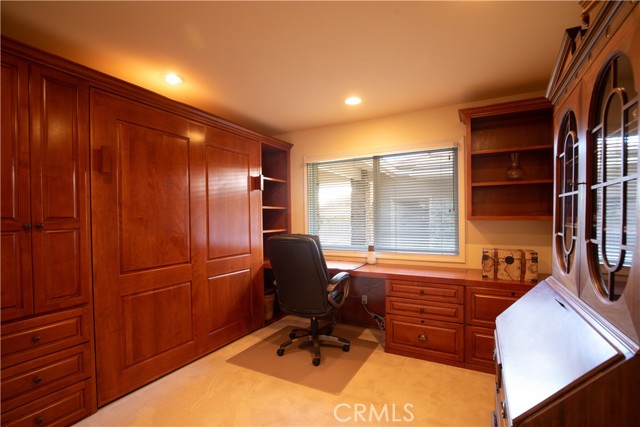 Bedroom used as office with Murphy bed