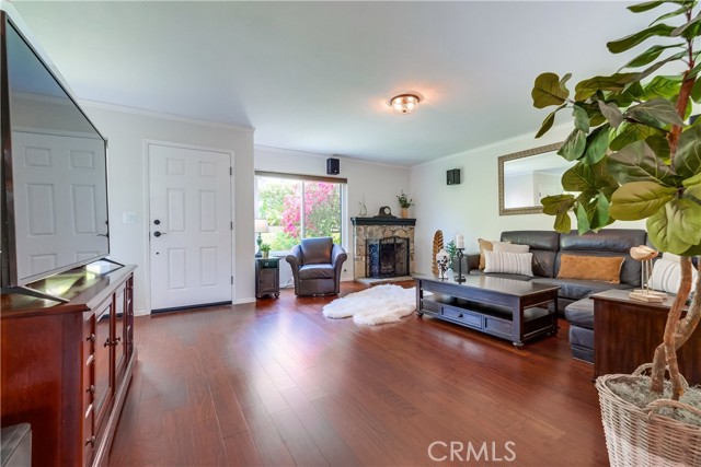 Living room with gas burning fireplace.