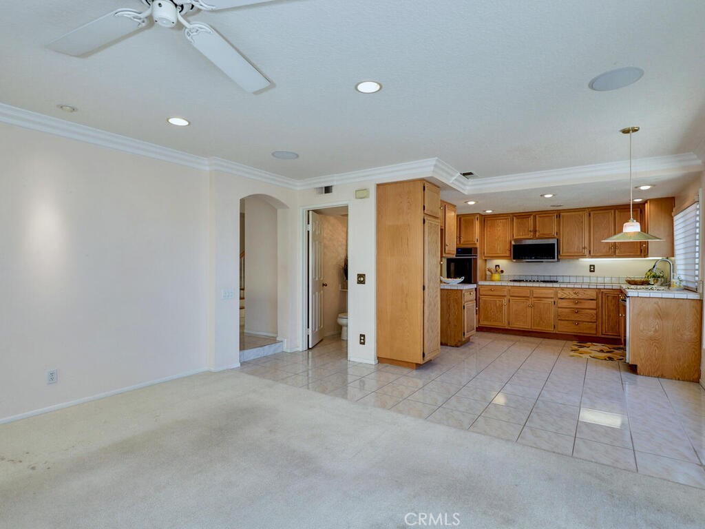 Family room looking into nook and kitchen