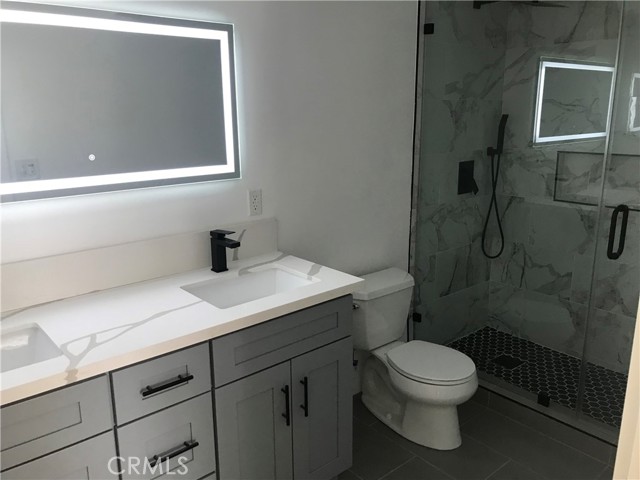 Jr Master Bath with his and her sinks