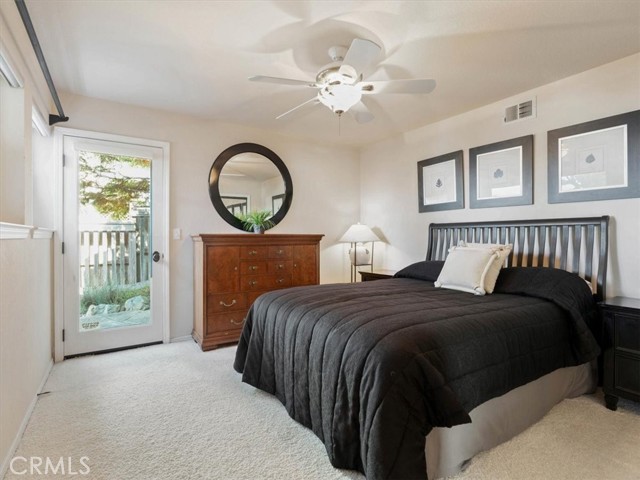 Bedroom #3 has a door to the backyard.