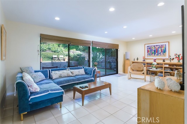 The family room opens onto the private back yard