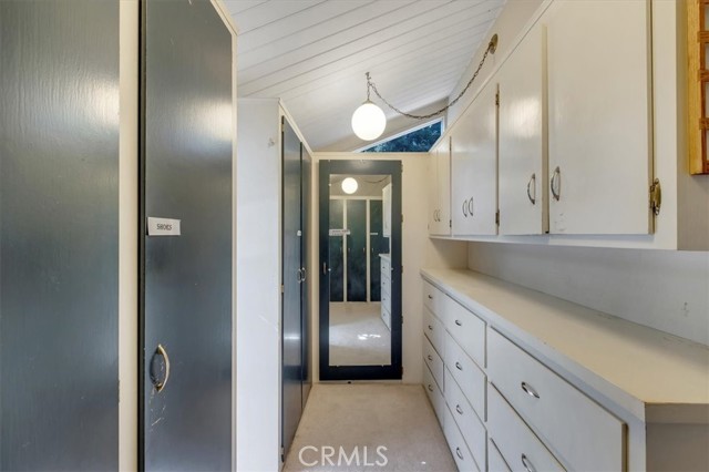 Walk in closet inside master suite