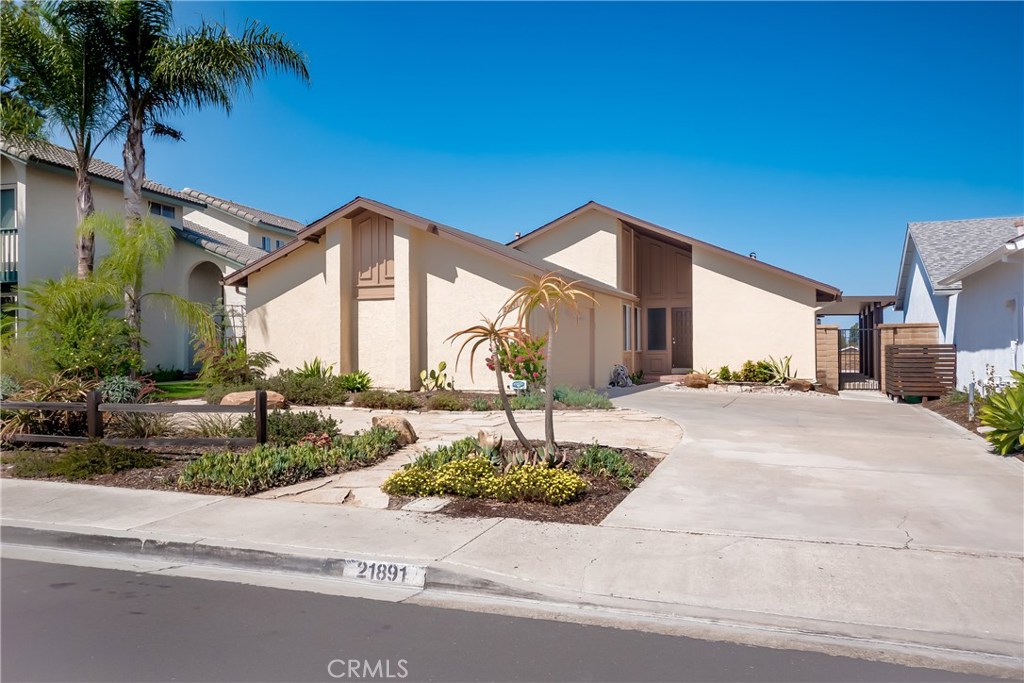 Impeccable and highly upgraded one story view home on wonderful cul-de-sac street only 2 miles to Lake Mission Viejo. Wonderful open plan with vaulted ceiling in living room with fireplace, recessed lights, ceiling fan and plantation shutters. Upgraded kitchen with granite counter, breakfast bar and stainless steel appliances including refrigerator. Master bedroom has an expanded closet and the bathroom was just remodeled with large walk-in shower and custom vanity with quartz counter and soft close features, operable skylight with solar powered shade, Panasonic quiet fan with heat and nightlight, Toto toilet as well as an added pocket door. Nice size secondary bedrooms with plantation shutters. Laminate floor in living and traffic areas. Inside laundry room. Direct access 2 car finished garage with insulated roll up door plus long driveway for plenty of extra parking. Smooth ceilings, PEX re-pipe, newer furnace and air conditioner, newer water heater with recirculation pump, newer electric panel, newer high quality roof, newer alumawood patio cover with integrated lighting and ceiling fan, rain gutters, dual pane windows, faux grass and drought tolerant landscape, fire pit, nearly new above ground spa, solar system. Low property tax rate and NO Mello Roos.