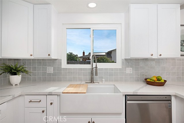 Utility sink with a view into the back yard.