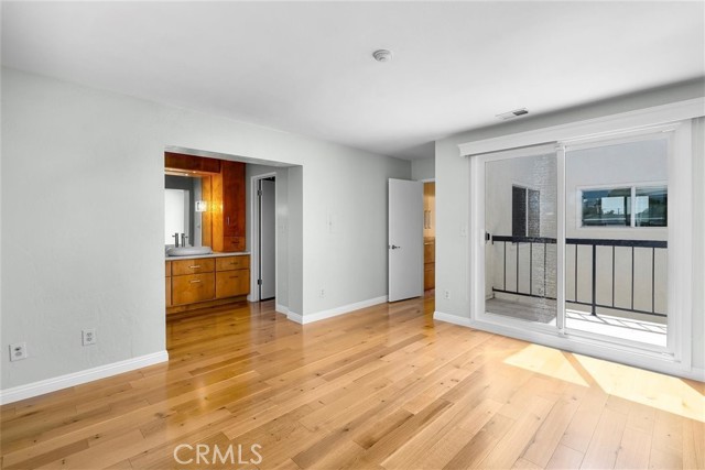 master looking towards entry and balcony door