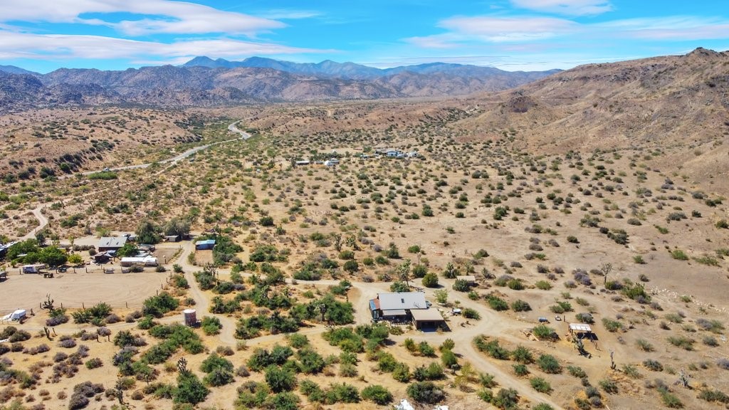 Barn is on the left side of this photo.  The home is on the right.