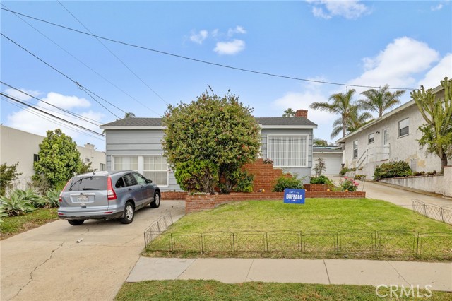 View of 618 Prospect from street with parking on driveway