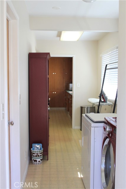 Laundry Area with Walk-In Pantry