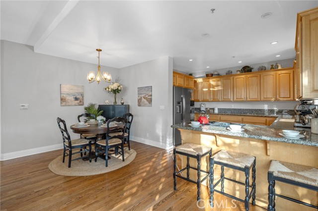 Dining area is free form, with room to expand as needed.  Plus, breakfast bar is a sweet spot for casual dining or a favorite beverage.