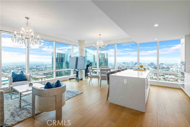 MUST SEE NEW 2 bed/2bath corner unit on the 41st floor of Tower II at Metropolis! The house is fully furnished. 2 blocks from L.A. Live and STAPLES Center in DTLA. This beautiful unit is surrounded by towering window walls capturing far-reaching, multi-directional views of the city skyline and surrounding hillsides. Two bedrooms include a gracious master suite with walk-in closet and spa-like bath. Contemporary details include Caesar stone countertops, custom wood cabinetry and Miele & Bosch appliances in the gourmet kitchen, as well as Nest Learning Thermostats, and 6" wide oak flooring as well as high ceilings throughout! Residents of Metropolis have access to an abundance of resort-style amenities, including 24/7 lobby attendant, concierge service, residence clubhouse, resort-style pool, sky garden, fitness and yoga studio, billiard, game and screening rooms, children's playground, putting green and dog park. Luxury high-rise living at its finest!!!